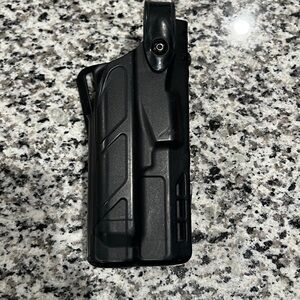 Glock 17 Safariland Holster with light.